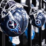 Tennessee Titans Lockers with helmets hanging on the door