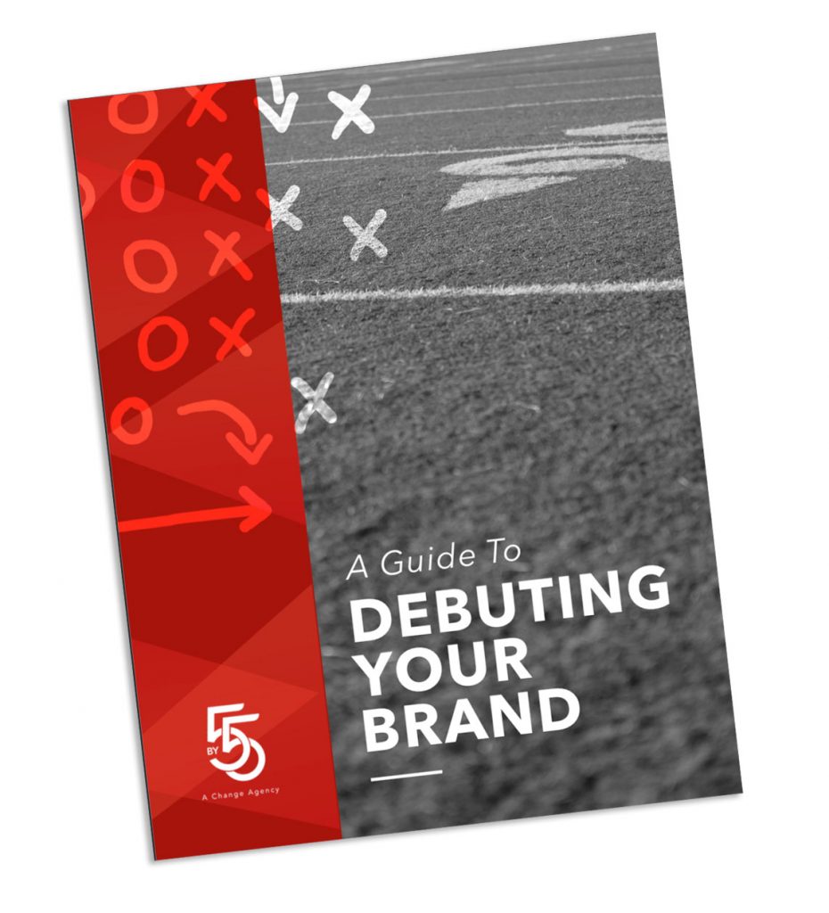 The cover of "A Guide to Debuting Your Brand" with the image of a football field